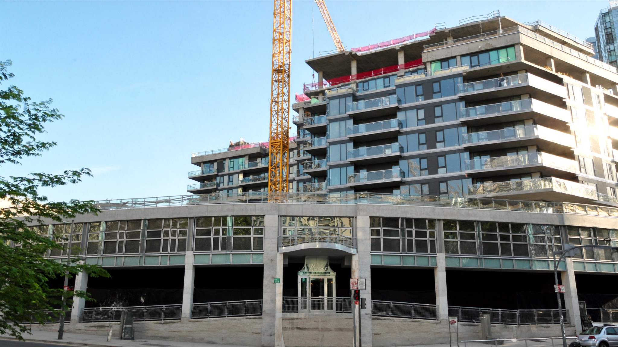Toronto condo tower under construction with a crane