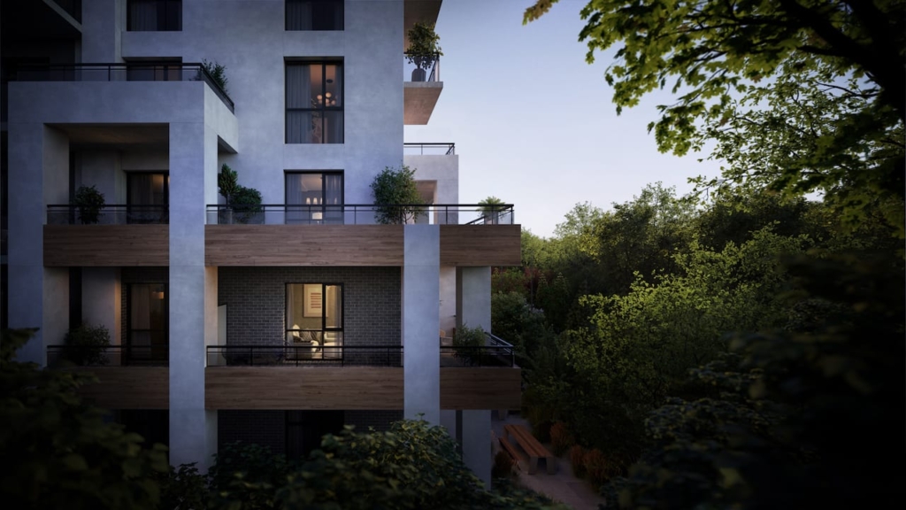 Mile and Creek Phase 3 Condos exterior at dusk surrounded by greenery