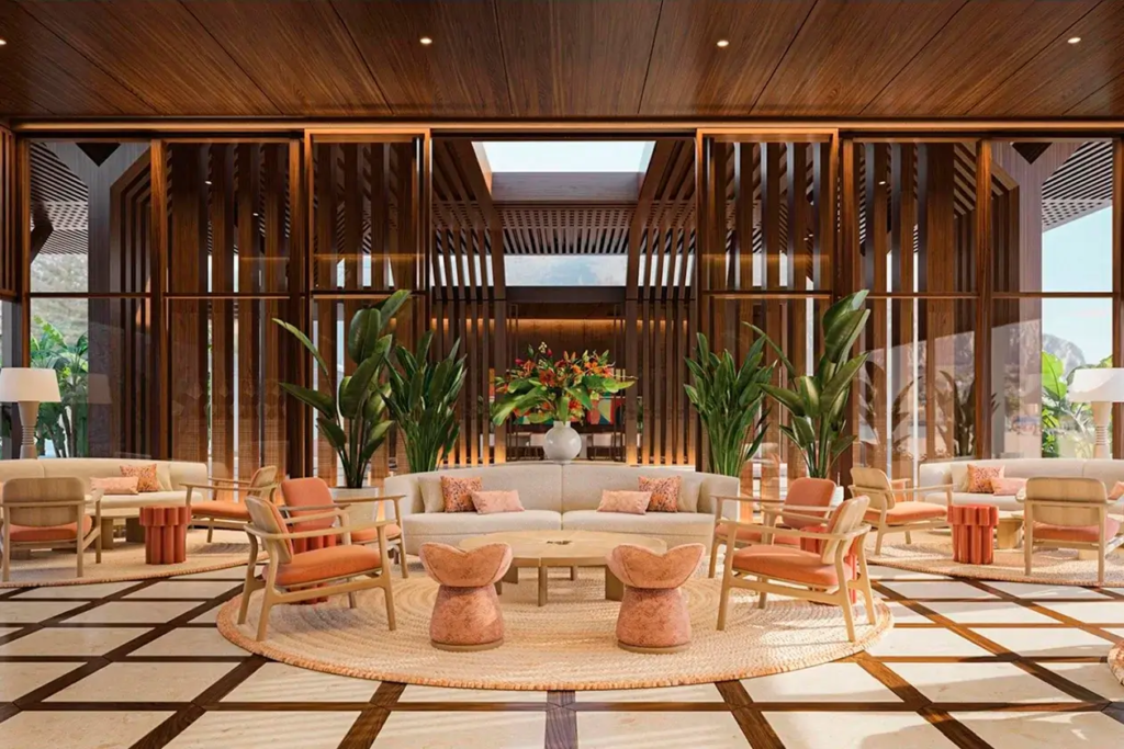 Luxury lounge area in Vie L'Ven with stylish seating, wooden slats, and tropical plants, embodying the essence of St. Maarten hospitality.