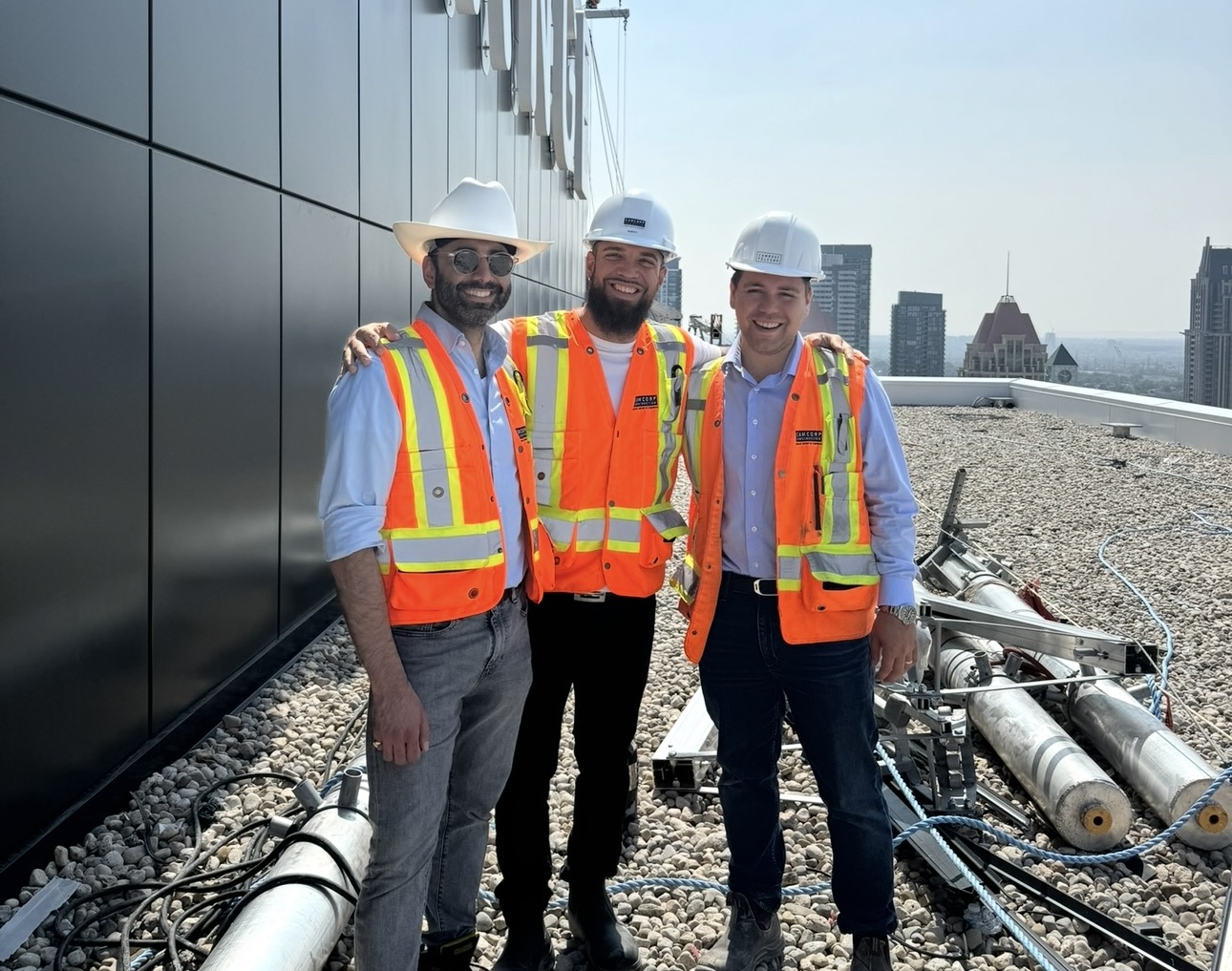 Daniel Zareh touring a condo construction site
