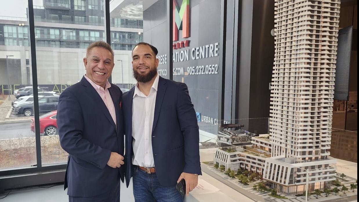 Daniel Zareh with his father at the M City presentation centre