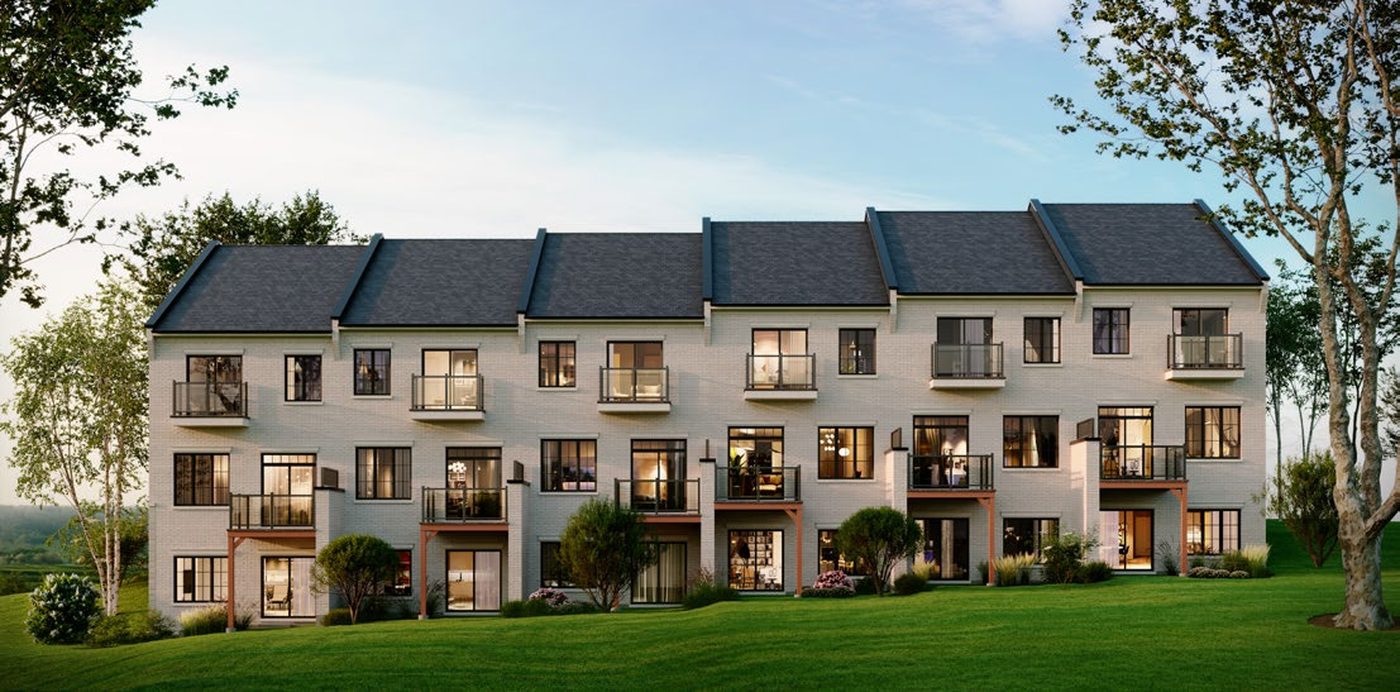 Eagle's View Bolton rear elevation showing walk-out basements and second-floor balconies