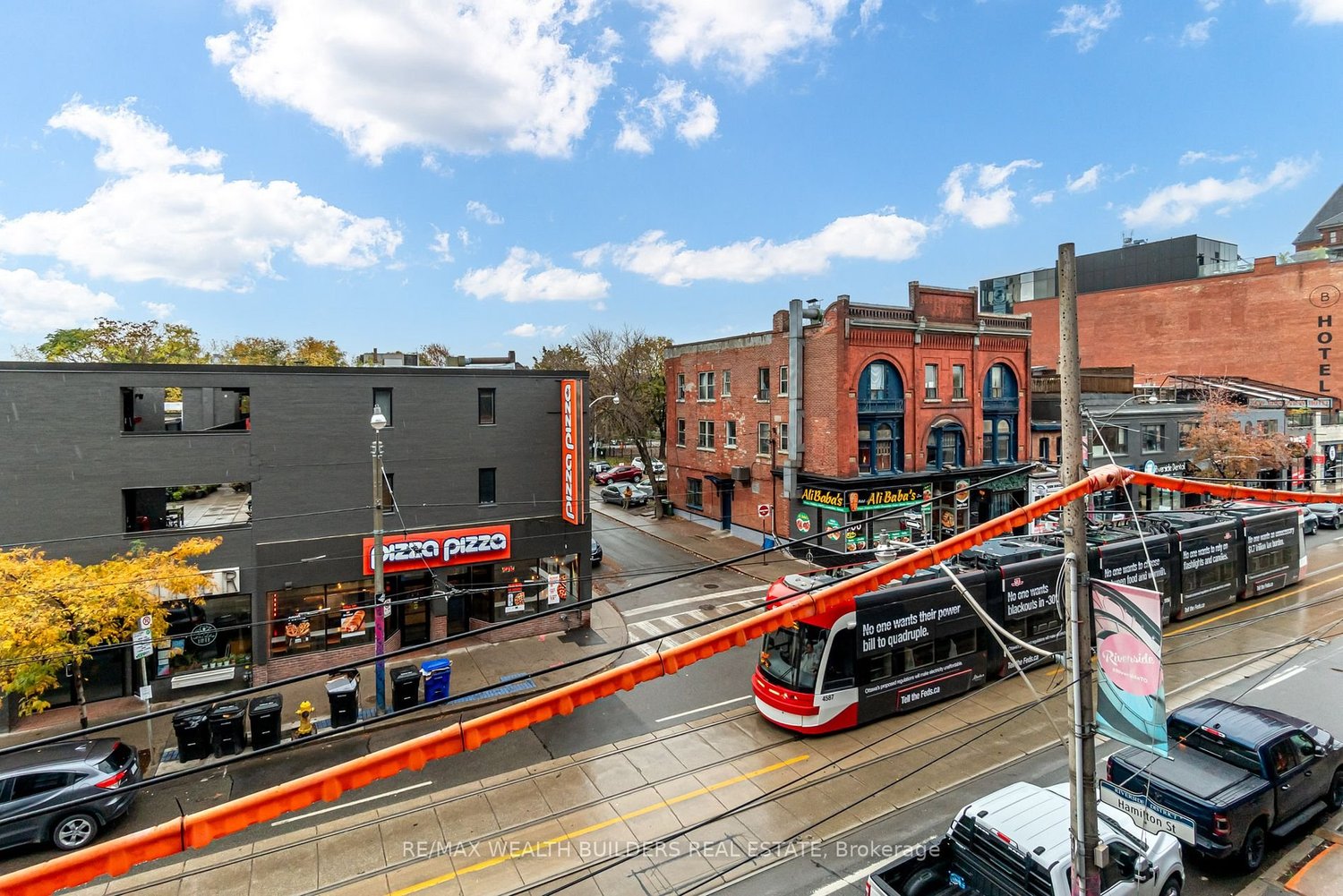 665 Queen St E 201
